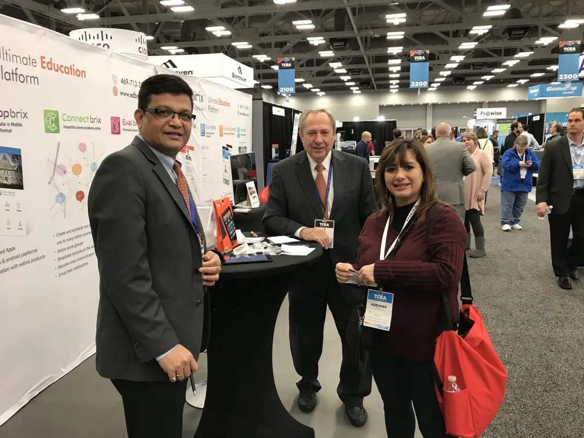 Vizipp team meeting educators at an education technology conference booth